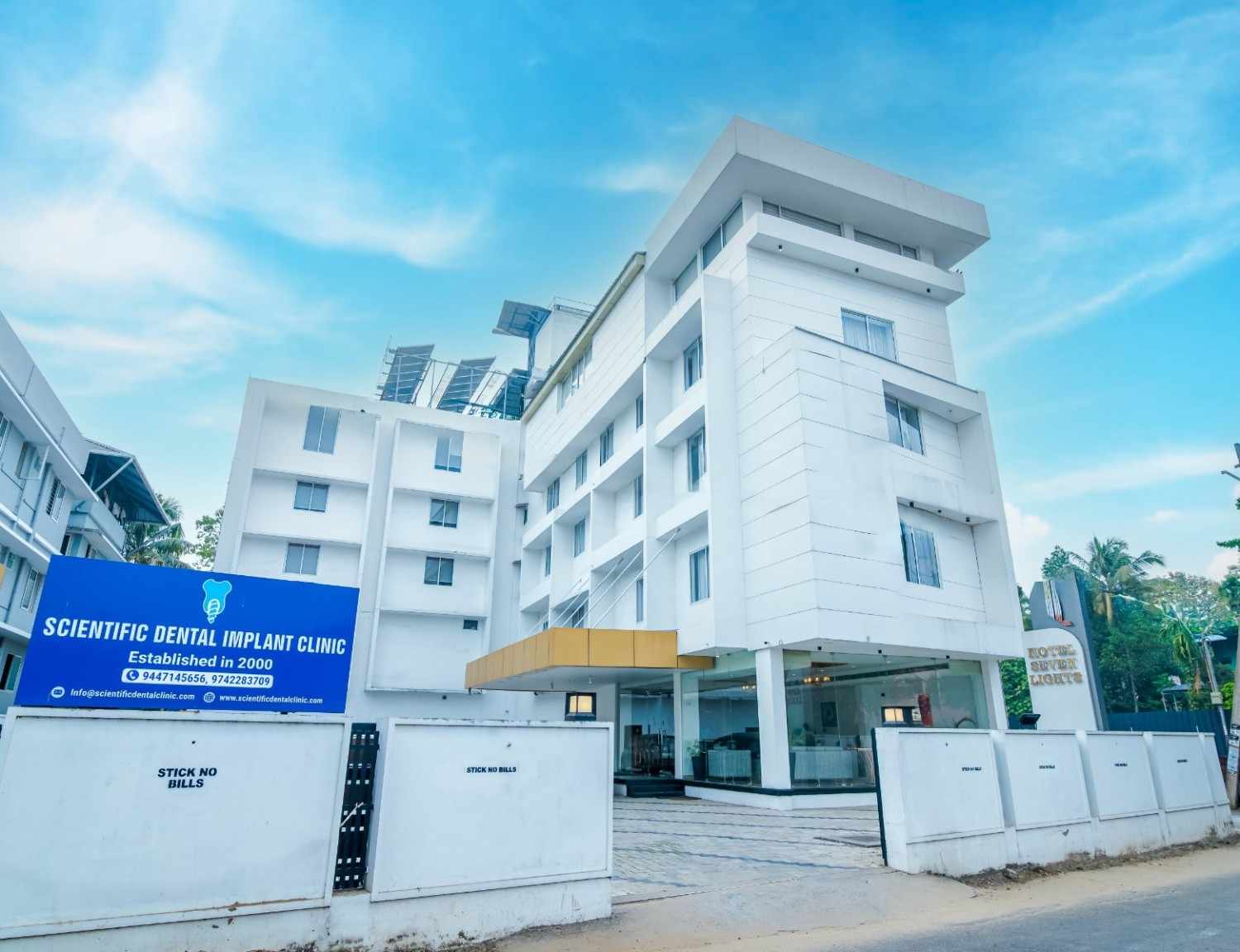 Scientific Dental Clinic building in Kochi Kerala offering advanced dental implants cosmetic dentistry and full mouth rehabilitation